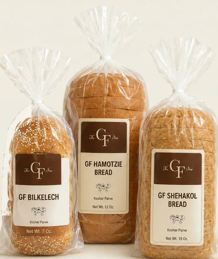 The GF Shop packaged gluten free products: GF Bilkelech, GF Hamotzie Bread and GF Shehakol Bread, each with a brown and cream label marked Kosher Parve